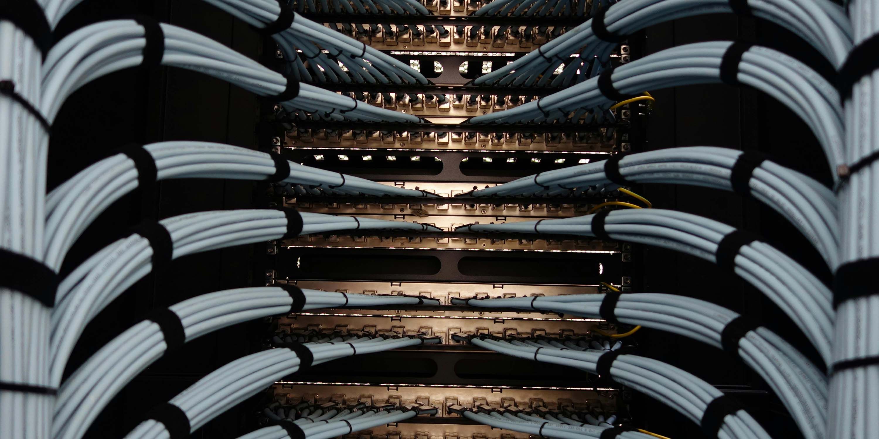 Control4 Touch panel in a able with a traditional home in the background